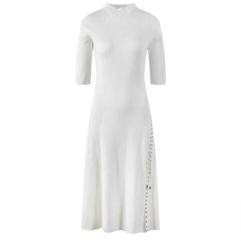French knitted dress with a socialite style slit and five quarter sleeves, paired with a base skirt