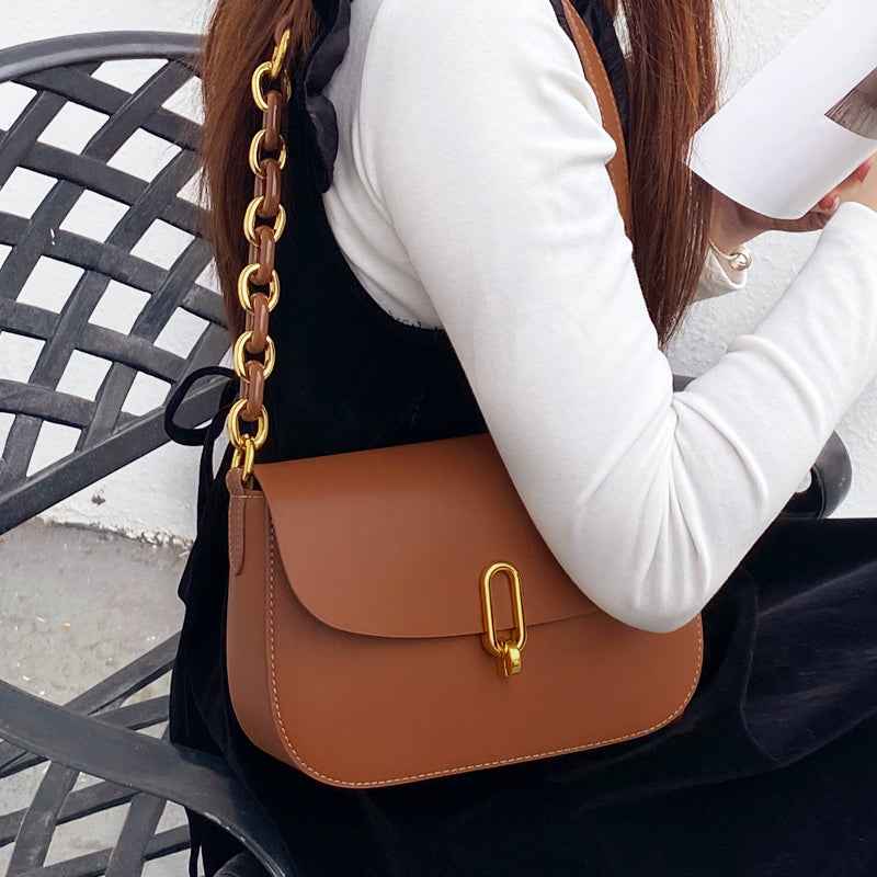 New fashion simple leather saddle bag niche lock women's bag shoulder messenger bag