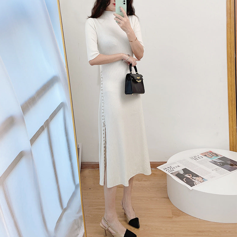 French knitted dress with a socialite style slit and five quarter sleeves, paired with a base skirt