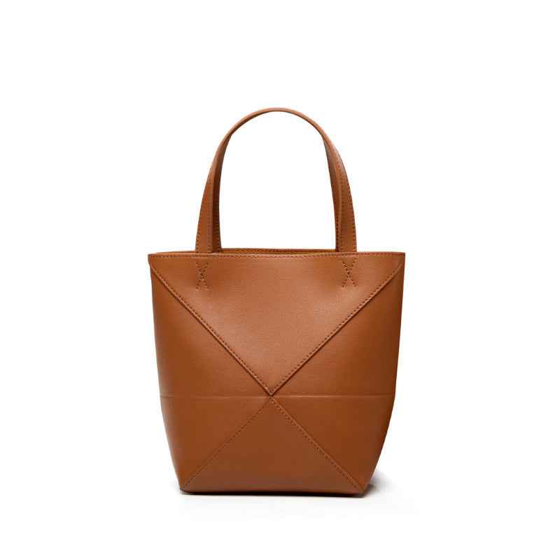 Large capacity single shoulder geometric splicing folding bucket bag