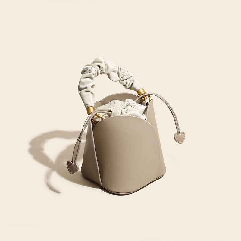 Bucket bag women summer new all match one shoulder Messenger small bag niche design leather handbag